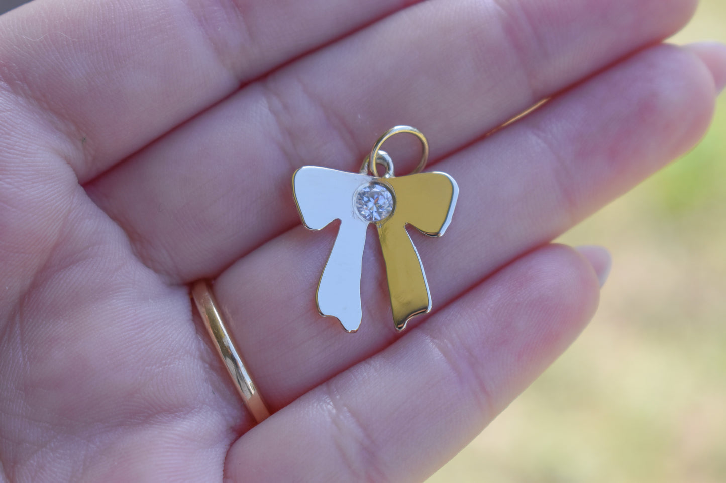 Handmade 14k Yellow Gold Bow Pendant with CZ