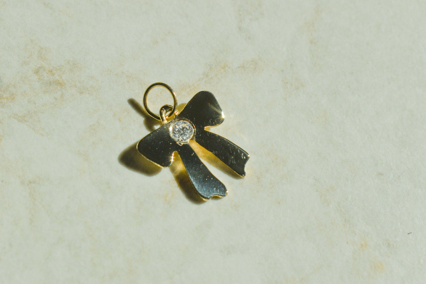 Handmade 14k Yellow Gold Bow Pendant with CZ